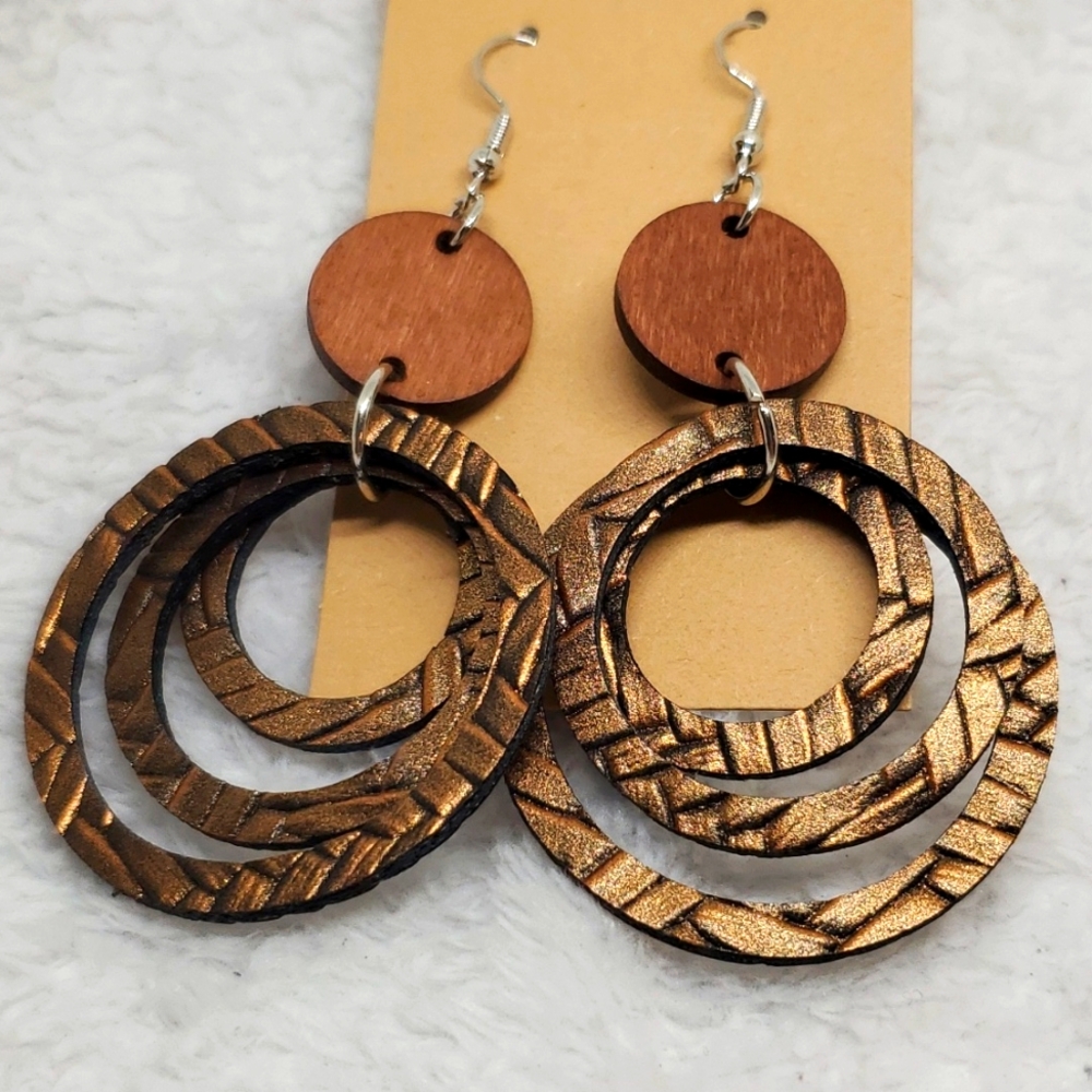 7/$10 Circle PU Leather Earrings, New